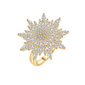 Gold ring with a star-shaped diamond design on a white background