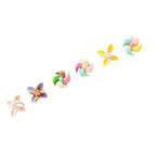 Six pastel-colored flower-shaped earrings arranged diagonally on a plain white background.
