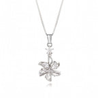 A silver-tone flower pendant necklace on a delicate box chain, featuring clear cubic zirconia stones in a starburst flower design with a small star accent above it, set against a plain white background.